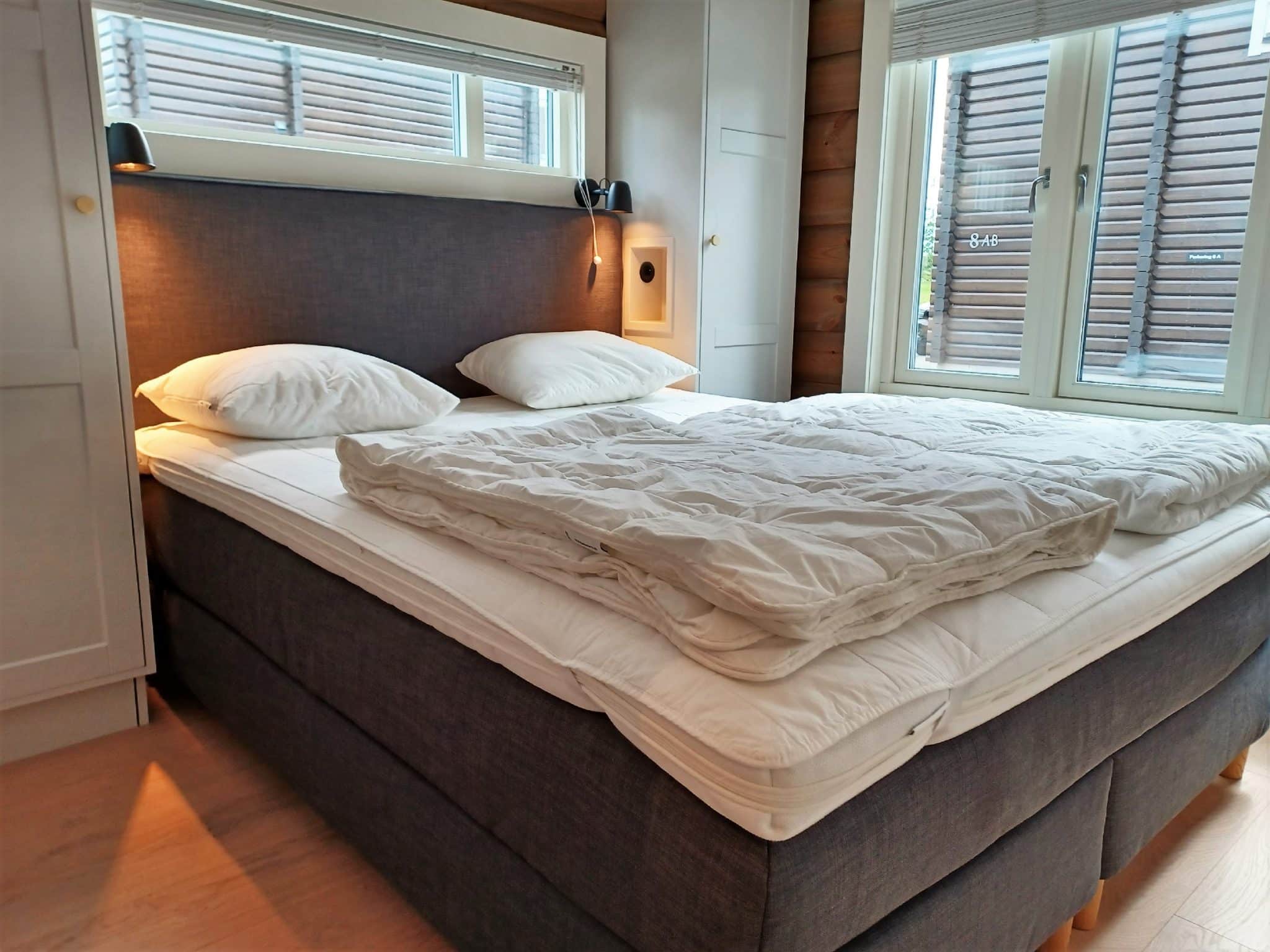 Double bed in the bedroom at Sadelhöjden